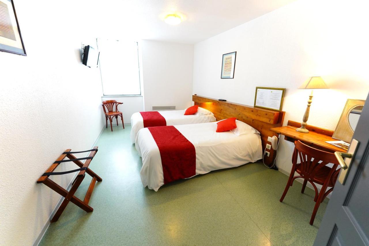 Logis Hotel Le Relais Des Remparts Allanche Экстерьер фото